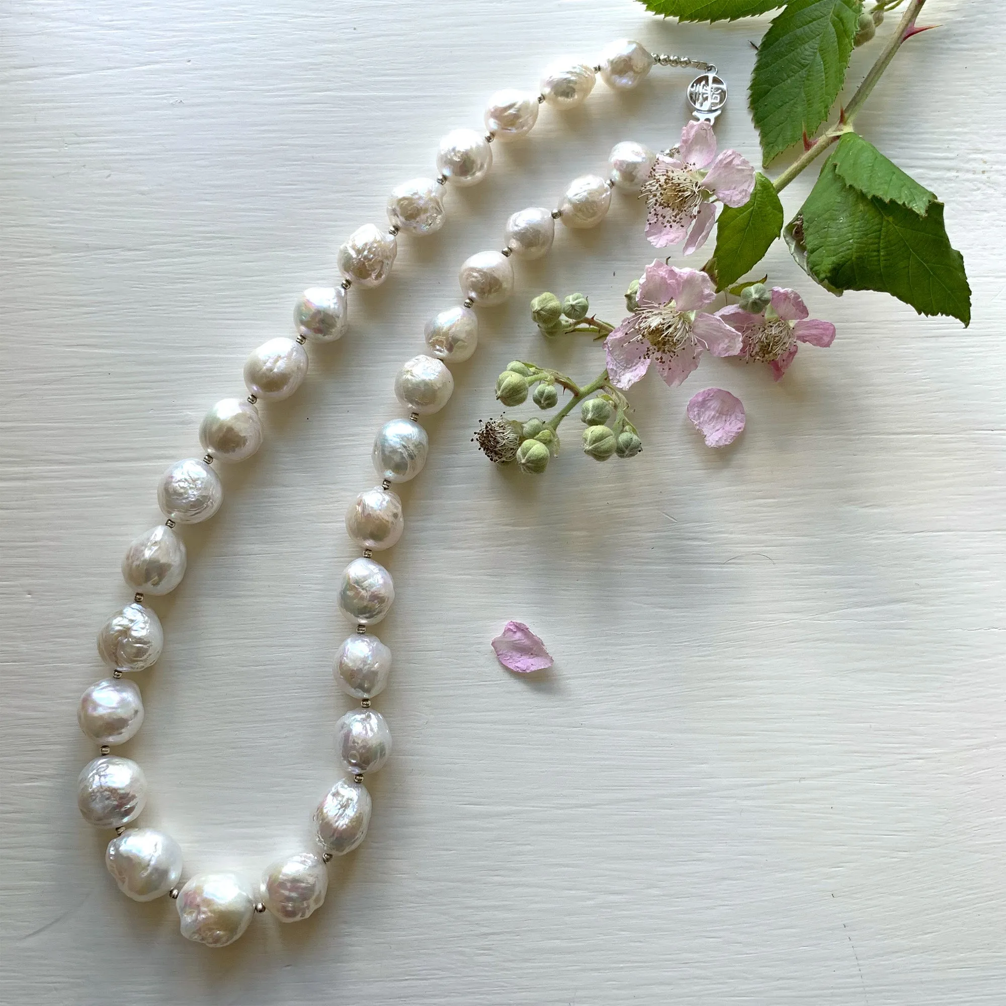 Necklace with large graduated cultured freshwater white baroque 'Kasumi' pearls